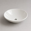 Vasque à poser ronde 40x40x12 cm en céramique blanche avec finition brillante